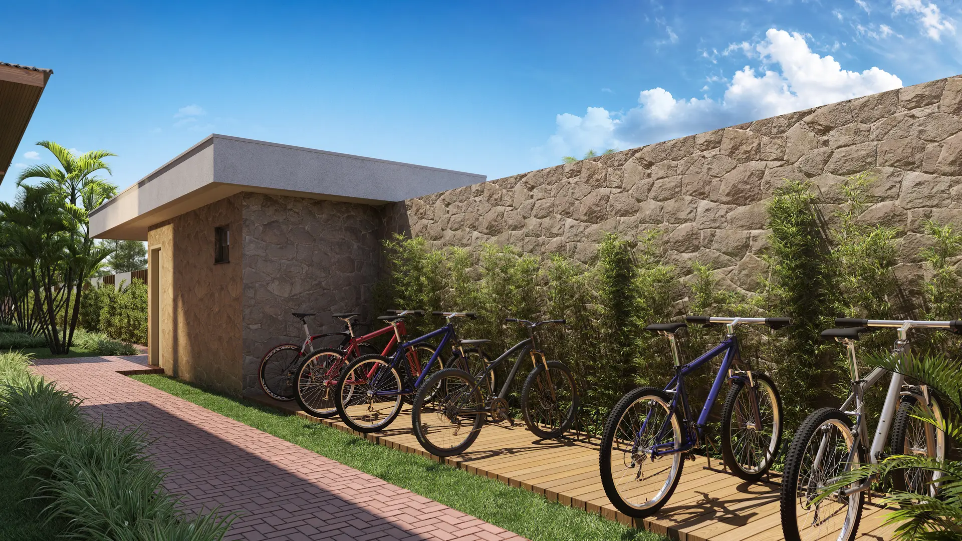 Bicicletário coberto junto ao muro de pedra
