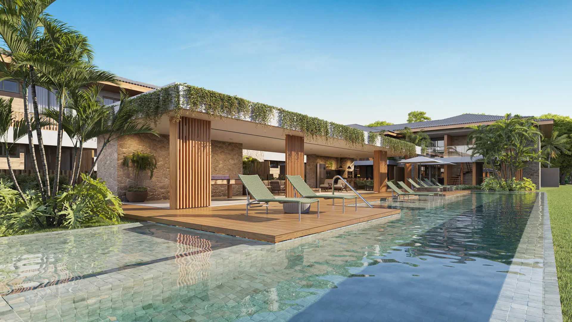 Piscina com raia longa e vegetação tropical